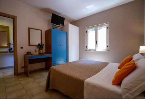 Hotel Villaggio Old River客房内的一张或多张床位