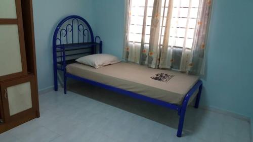马六甲MITC民宿客房内的一张或多张床位