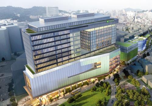 首尔首尔弘大智选假日酒店的享有带灯的大建筑的顶部景色