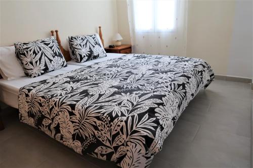 Villa Mango Tauro客房内的一张或多张床位