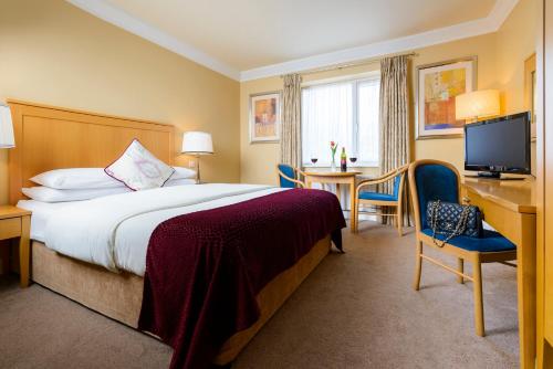 丁格尔湾大酒店 客房内的一张或多张床位