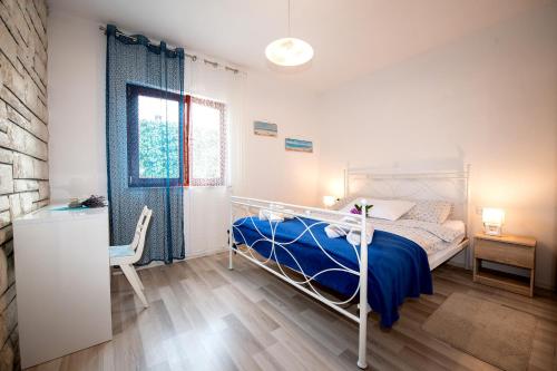 Apartment Mediteraneo客房内的一张或多张床位