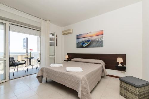 Marina D'Agrò Residence客房内的一张或多张床位