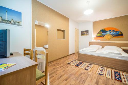 布达佩斯市中心白银酒店客房内的一张或多张床位