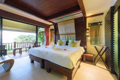Samui Jasmine Resort - SHA Plus客房内的一张或多张床位