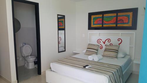 加勒比海岛皮索2号酒店客房内的一张或多张床位