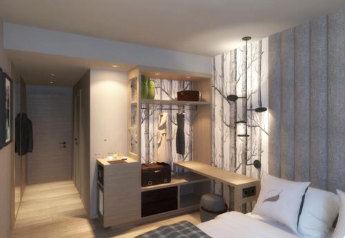 巴尼奥迪罗马涅罗赛欧优若泰尔梅疗养度假酒店的一间卧室配有一张床和一张书桌