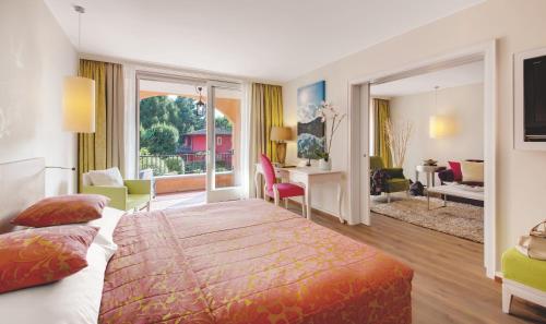 阿斯科纳贾尔迪诺酒店客房内的一张或多张床位