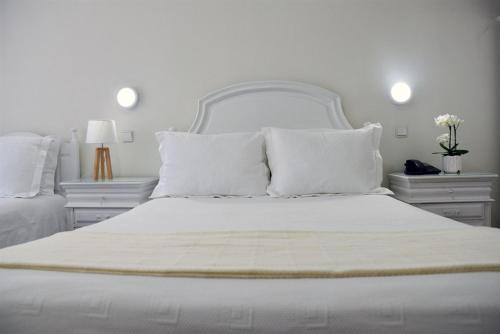 Hotel Visconde客房内的一张或多张床位