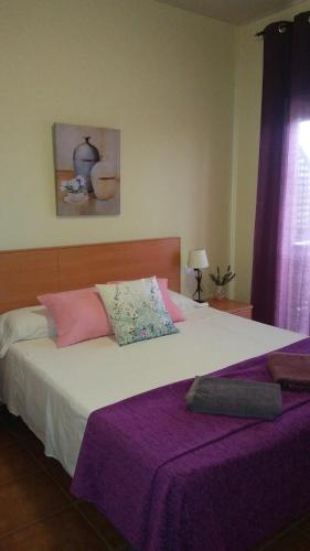 Hostal Sant Roc客房内的一张或多张床位