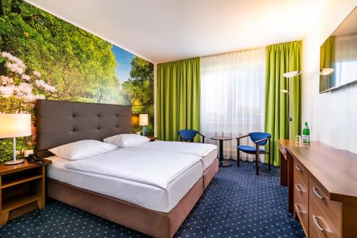 特普灵AHORN海景酒店客房内的一张或多张床位