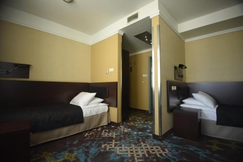 波托菲诺酒店客房内的一张或多张床位