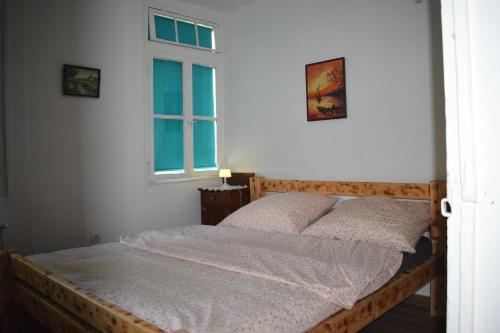Guest House Mundzic- Sumski Mir客房内的一张或多张床位