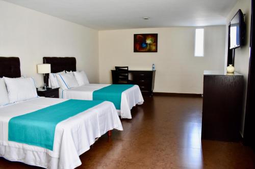 乡村酒店及套房客房内的一张或多张床位