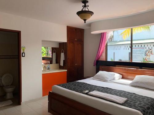 Hotel Yurupary AMAZONAS客房内的一张或多张床位