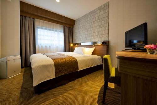 仙台国际酒店客房内的一张或多张床位