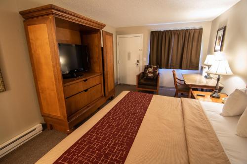 乌鸦山顶小屋酒店客房内的一张或多张床位