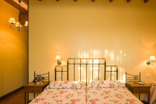 帕萨达普拉达特浦酒店和餐厅客房内的一张或多张床位