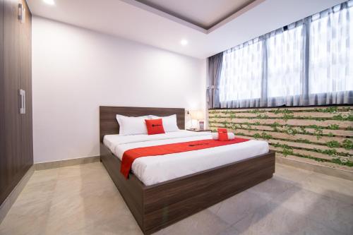 AHA Residence Dien Bien Phu near Hang Xanh Binh Thanh客房内的一张或多张床位