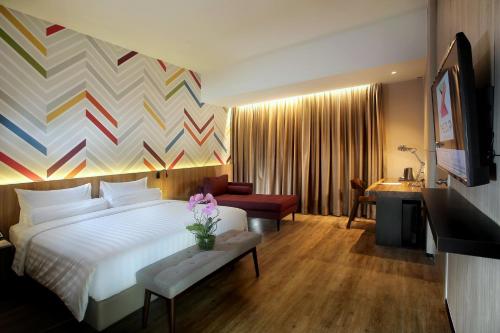 The Zuri Hotel Palembang客房内的一张或多张床位
