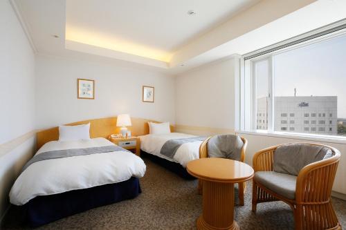 京瓷酒店客房内的一张或多张床位