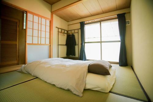 Yukinoura Guest House Moritaya客房内的一张或多张床位