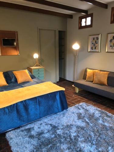 Rent apart Las Condes客房内的一张或多张床位