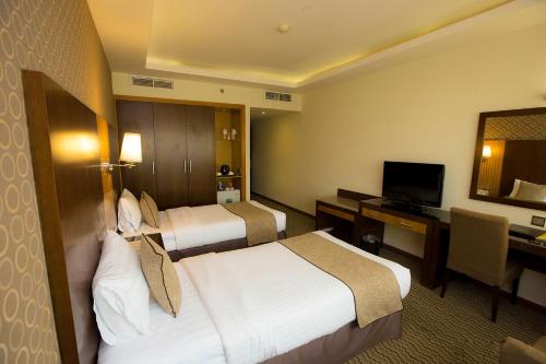 Fortune Plaza Hotel, Dubai Airport客房内的一张或多张床位