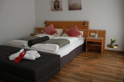 Enjoy 1313AG Hotel Touring客房内的一张或多张床位