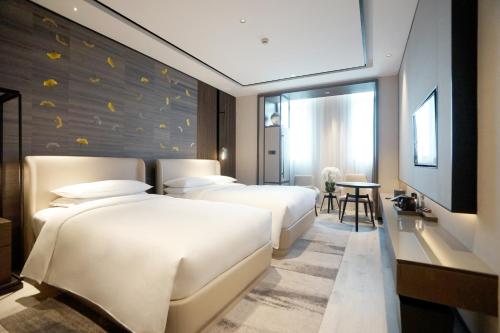 云和夜泊酒店（上海国际旅游度假区浦东机场店）客房内的一张或多张床位