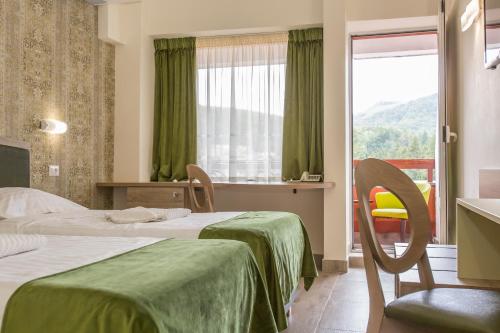 Hotel Olanesti & Spa Medical客房内的一张或多张床位