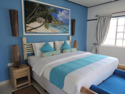 海岛魅力别墅客房内的一张或多张床位
