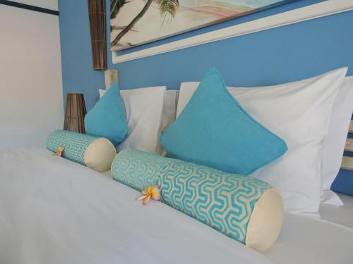 海岛魅力别墅客房内的一张或多张床位
