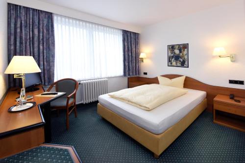 LAT Hotel & Apartmenthaus Berlin客房内的一张或多张床位