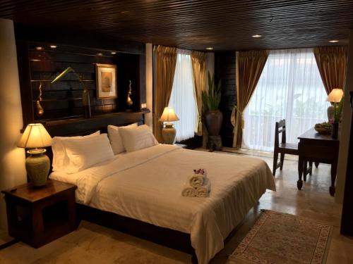 Sakhila Thai Home Stay客房内的一张或多张床位