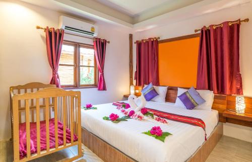 Pinthong Aonang Villa - FREE SHUTTLE SERVICE TO THE BEACH客房内的一张或多张床位