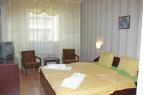 Hotel Trakia客房内的一张或多张床位