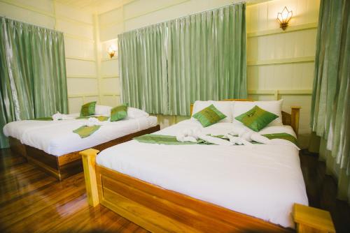 SuanTung Coffee & Guesthouse客房内的一张或多张床位