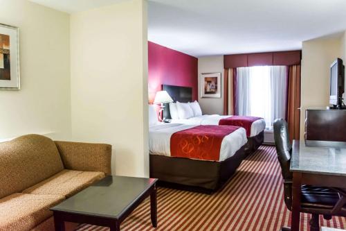棕榈湾康福特套房酒店 - 墨尔本客房内的一张或多张床位