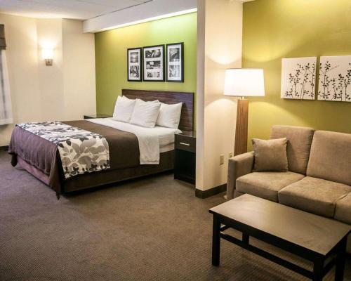 黑格斯敦套房舒眠酒店客房内的一张或多张床位