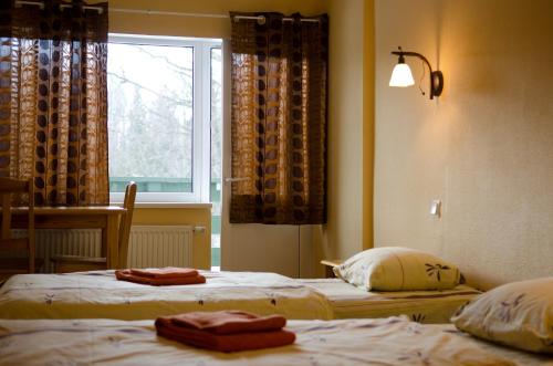 奈里伽维假日酒店客房内的一张或多张床位