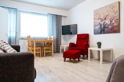 Apartamentos Joensuu - Kauppakatu 7的休息区