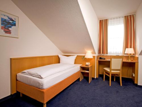 帕绍苏德IBB酒店客房内的一张或多张床位