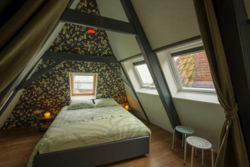 Tulpenhuis Enkhuizen客房内的一张或多张床位