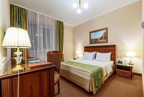 喀山瑞丽塔酒店客房内的一张或多张床位