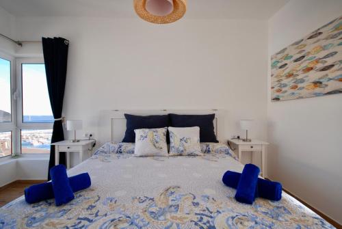 Sea Lovers Jacuzzi Fuerteventura客房内的一张或多张床位