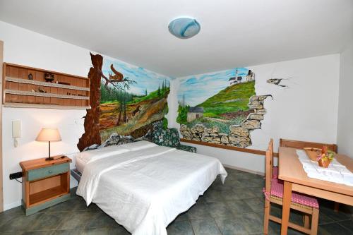 Agritur Volpaia rooms and apartments客房内的一张或多张床位