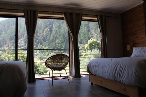 BancoArena Hotel - Refugio Ribera客房内的一张或多张床位