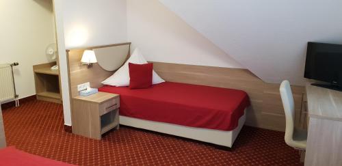 弯格纳兰多斯公寓酒店客房内的一张或多张床位