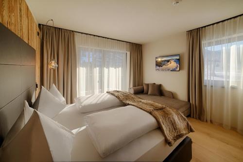 K1 Mountain Chalet - Luxury Apartements客房内的一张或多张床位